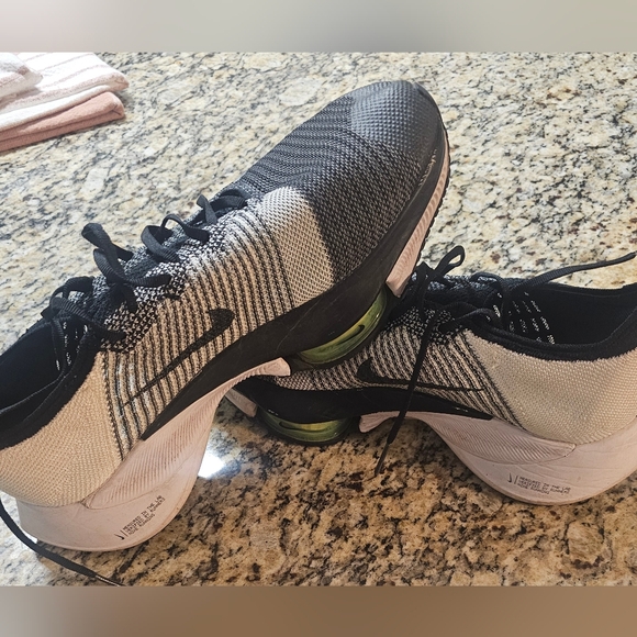 Nike Air Zoom Tempo NEXT% Flyknit running shoes, specifically in  \